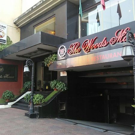The Woods Manor Mg Road Hotel Kochi Exterior photo